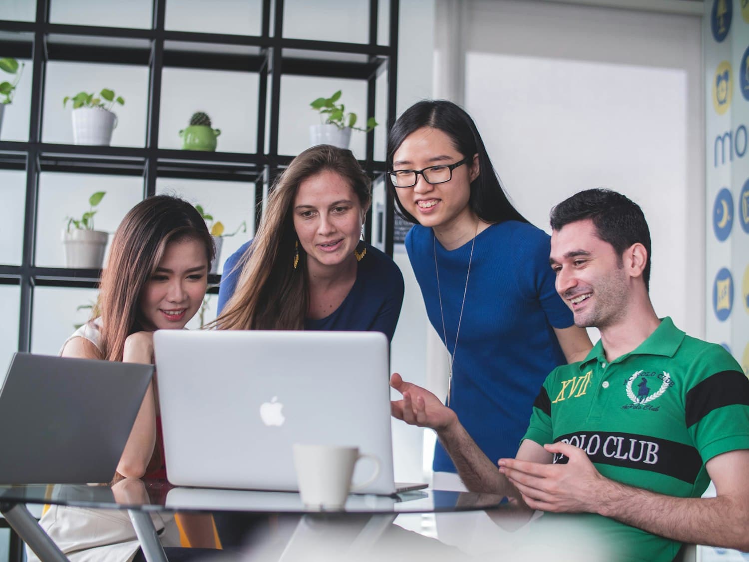 The SMAART Payroll team collaborating in the office